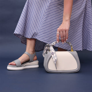 An Evergreen Collection of Footwear & Handbags